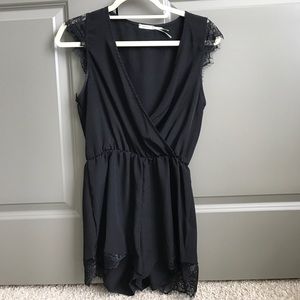 Black Sleeveless Romper with Lace Detail