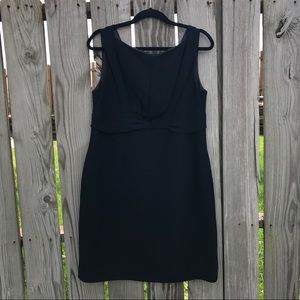 Black evening dress with knot detail in the front.