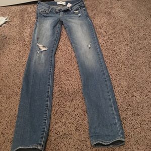 Medium toned ripped jeans