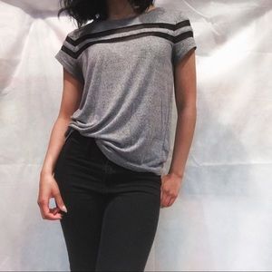 Grey top with black mesh stripes