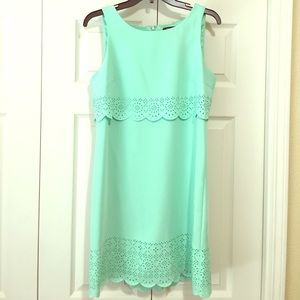 Spring/summer dress with gorgeous cutout detail.