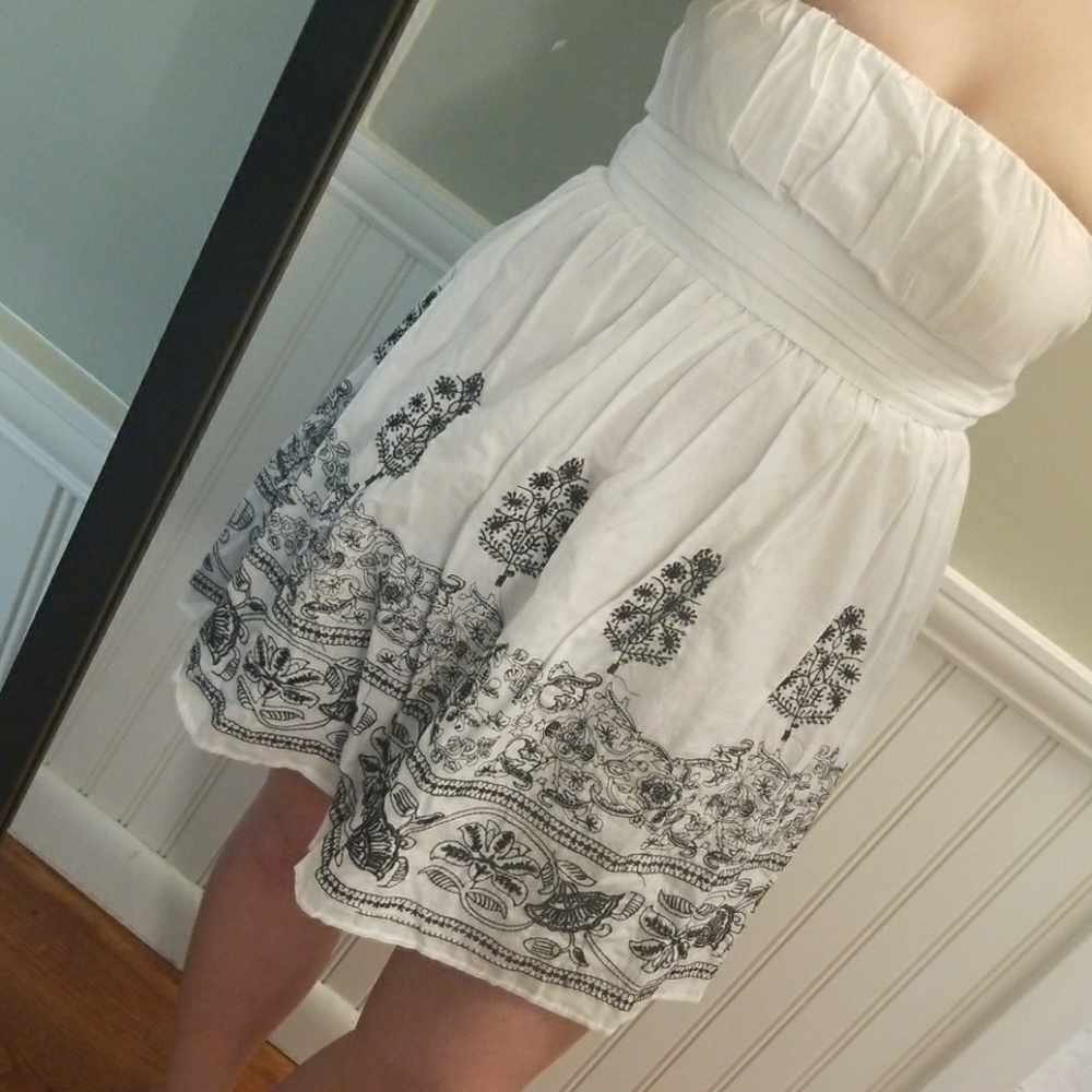 What with black embroidery dress