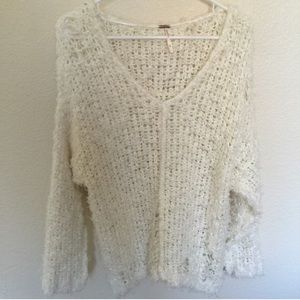 Distressed white free people sweater