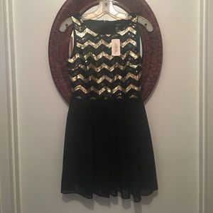 black and gold sequin dress