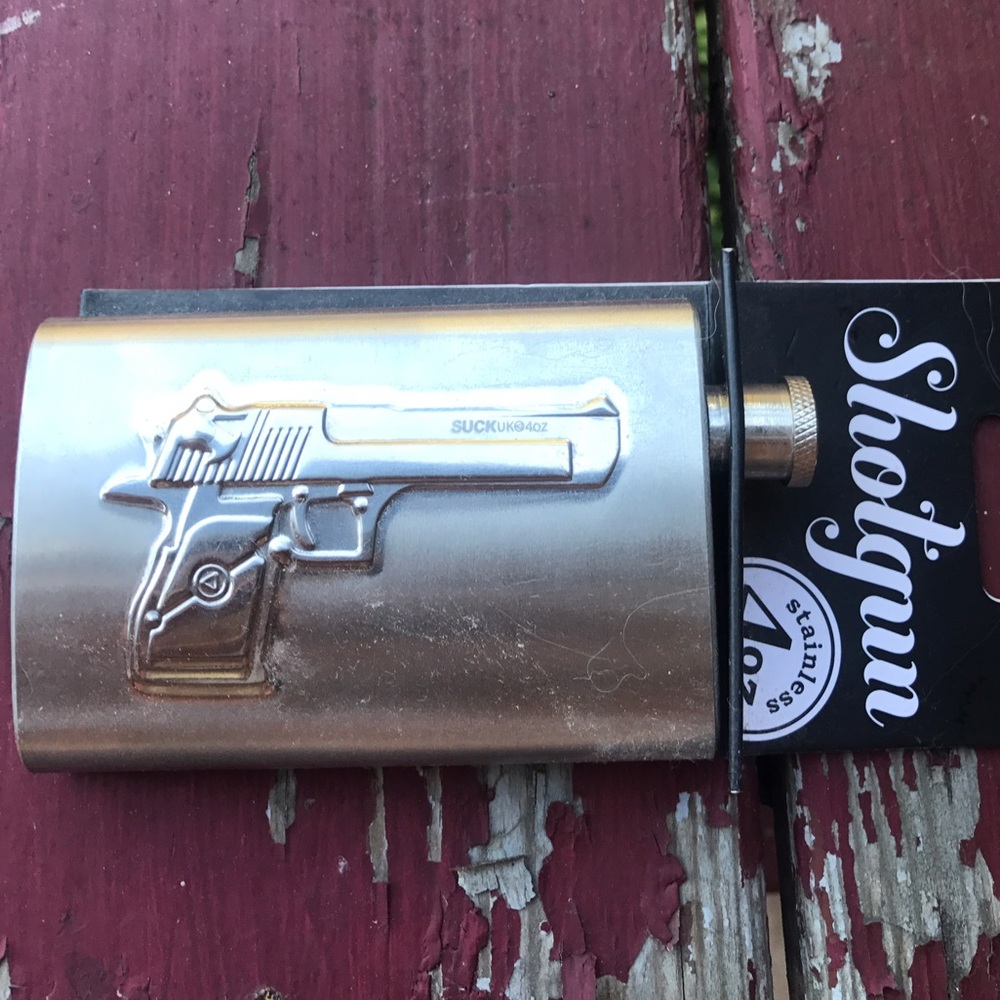 Brand new shot gun flask tagged for exposure