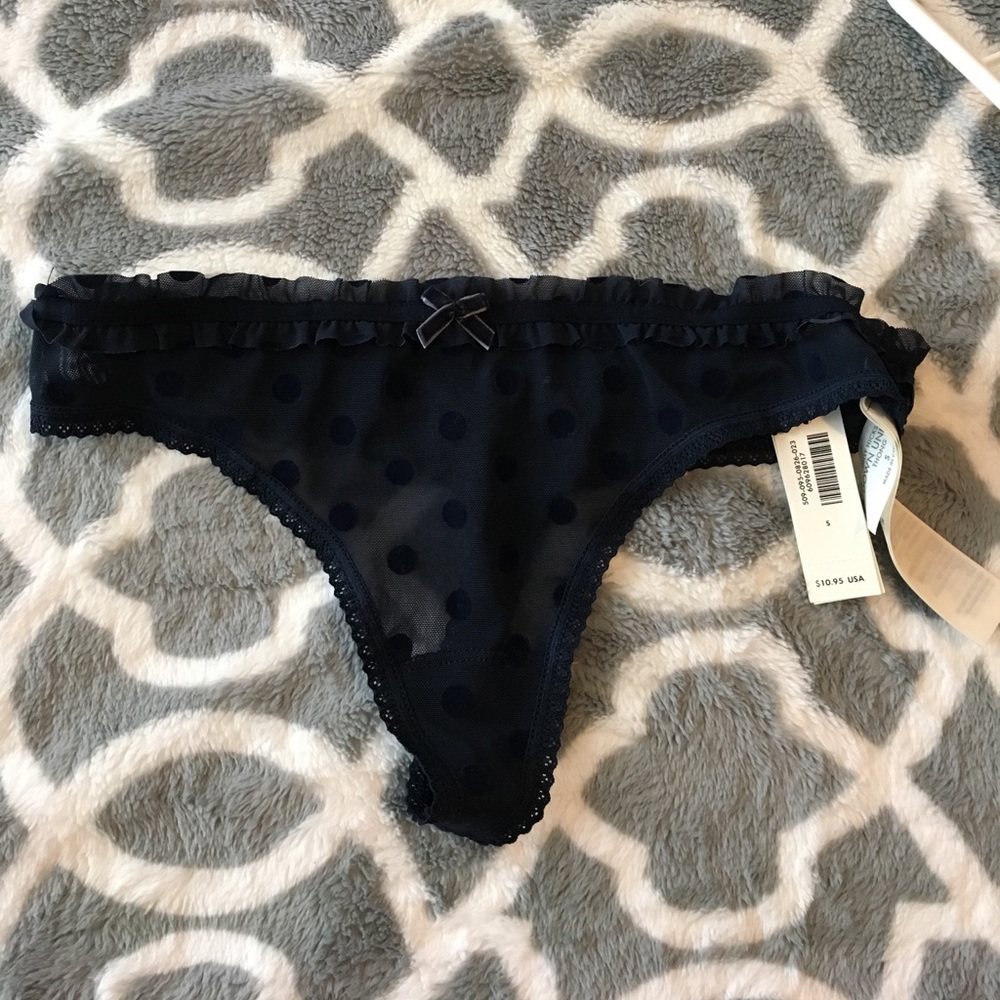 NEW with tags: Gilly Hicks navy thong, size S.