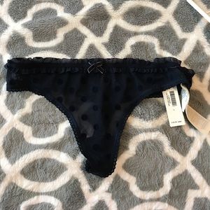 NEW with tags: Gilly Hicks navy thong, size S.