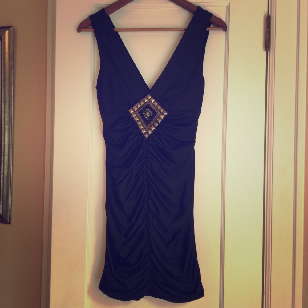 Black boutique ruched mini dress perfect for NYE