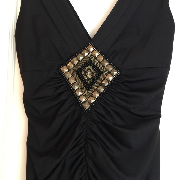 Black boutique ruched mini dress perfect for NYE - Picture 2 of 3