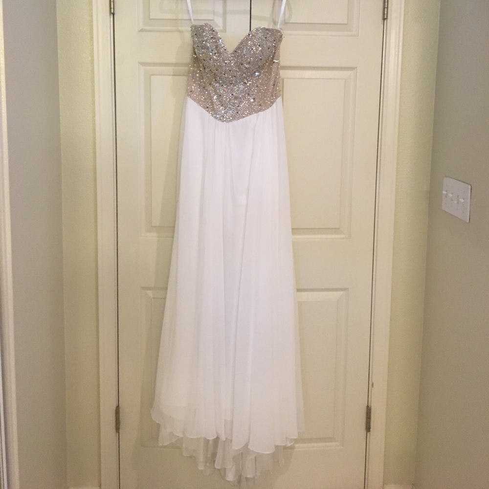 Tarani culture prom or pageant ivory gown.