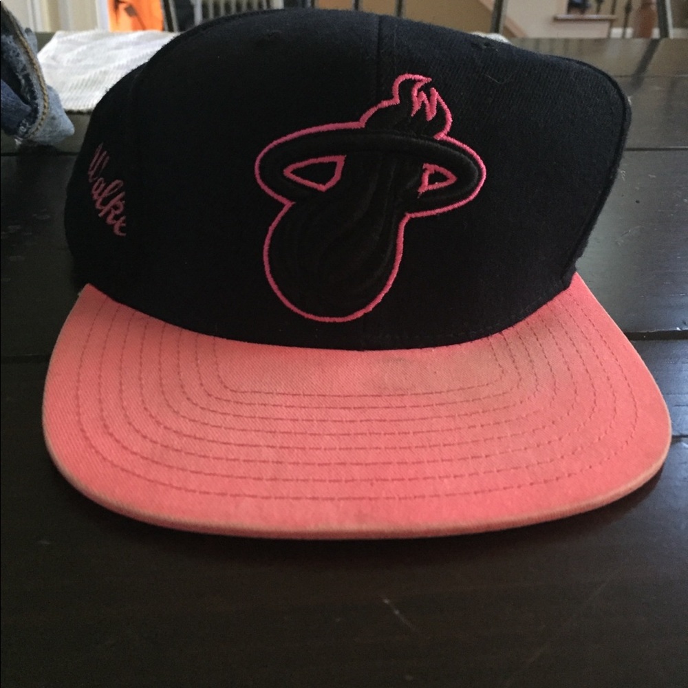 Pink and black hat