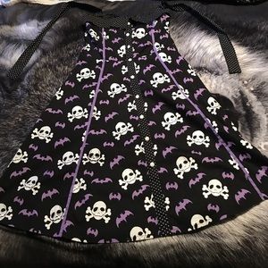 Sourpuss skulls and bat wings