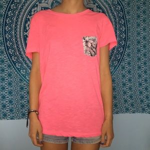 Pink top with floral frocket