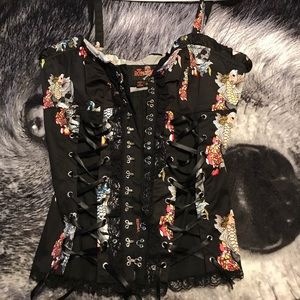 Clasp and lace up corset