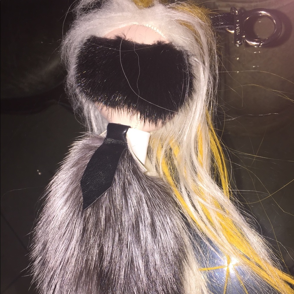 A brand new fendi Carl Lingerfiled key Chain/puff