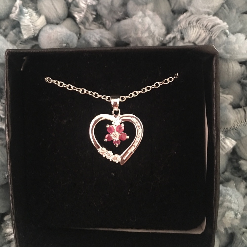 Silver colored heart necklace