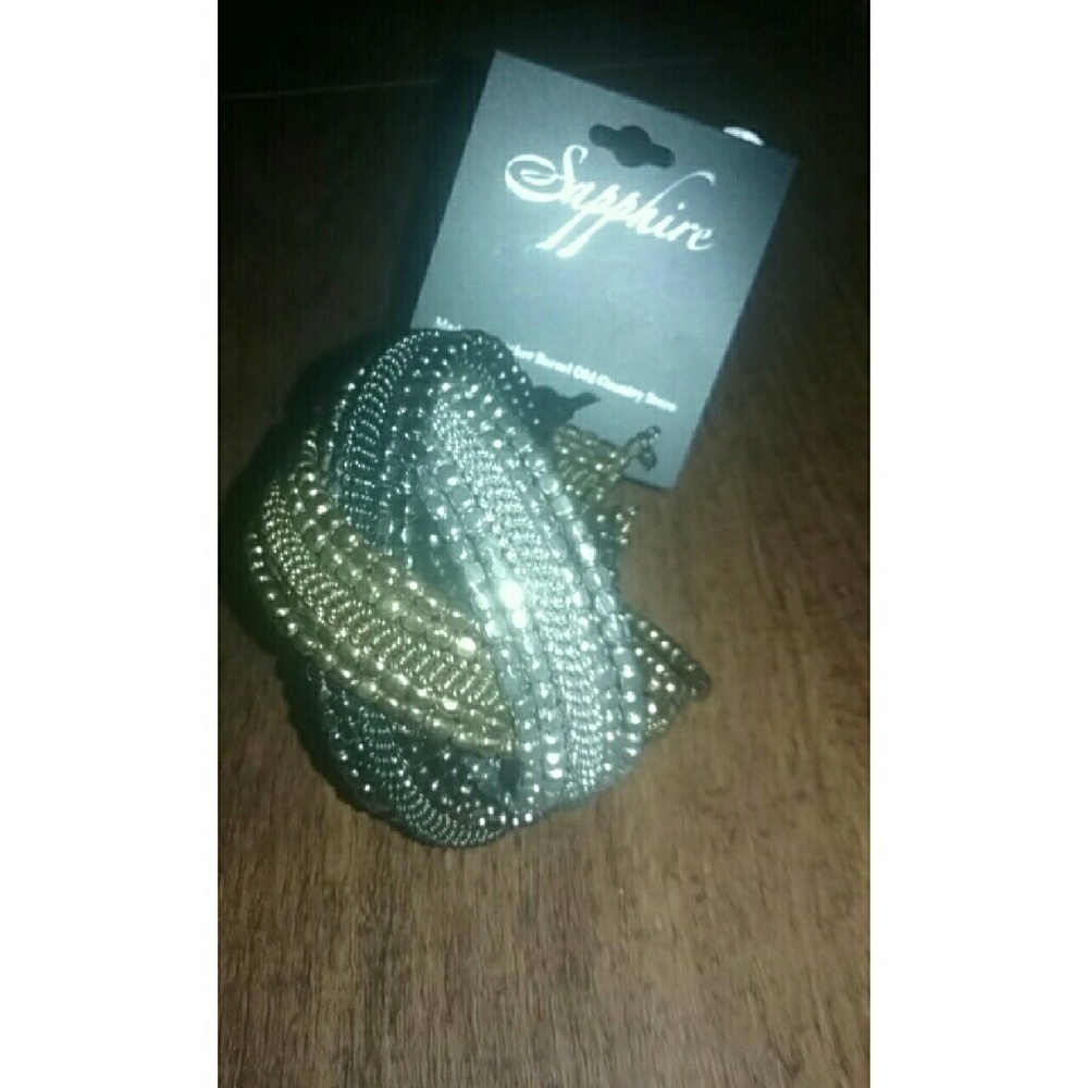 Sapphire silver, black, and gold bracelet.