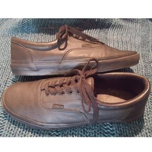 Men's Black leather vans.