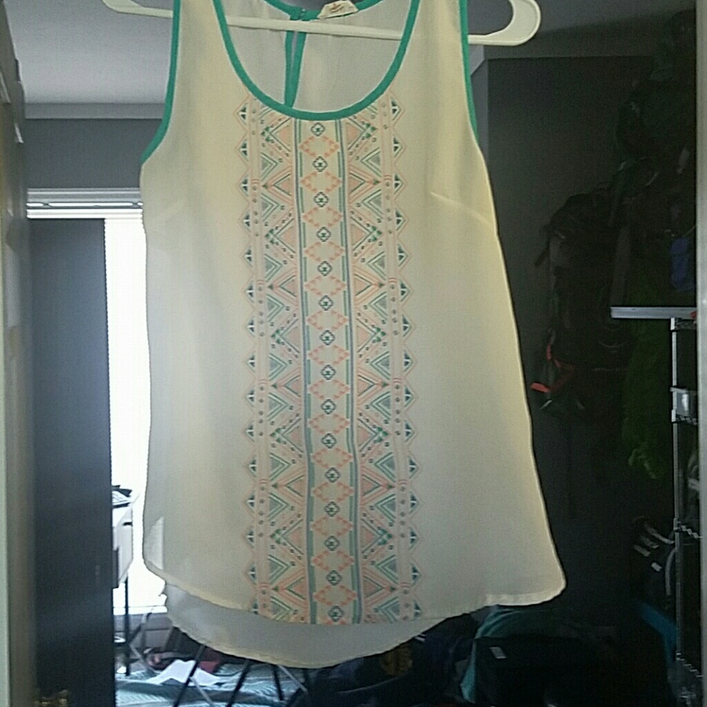 White tank top with asouthwest design in turquoise