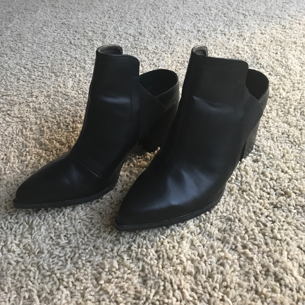 Backless slip on ankle boots.