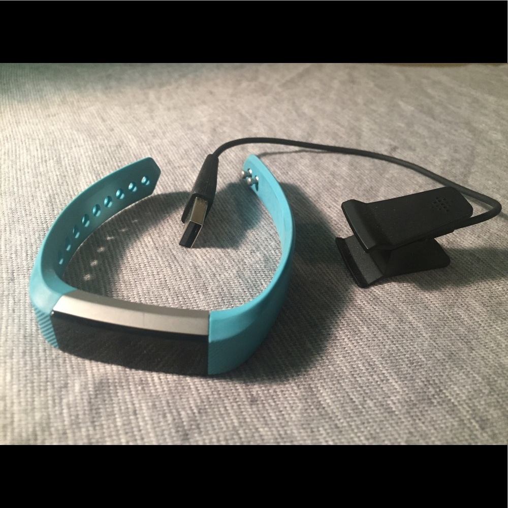 Teal Fitbit Alta with Charging Cable