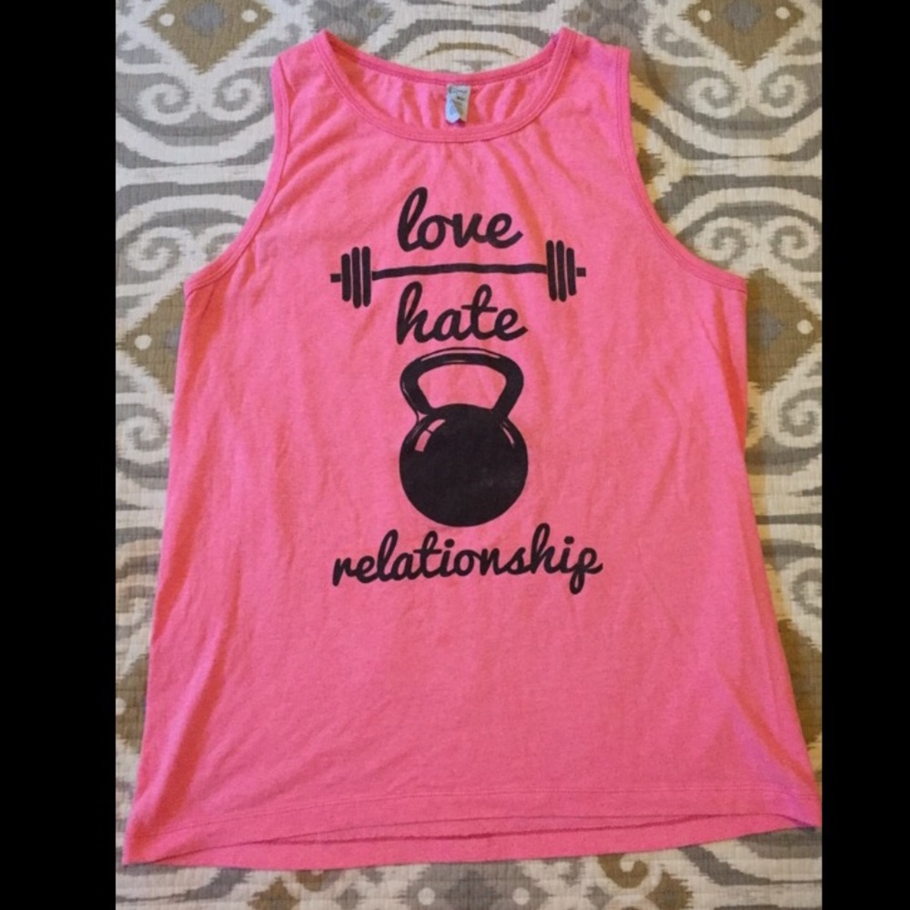 Gym Tank SIze Small but fits like a Medium