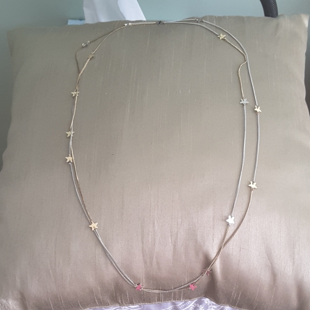 Silver and gold star necklace