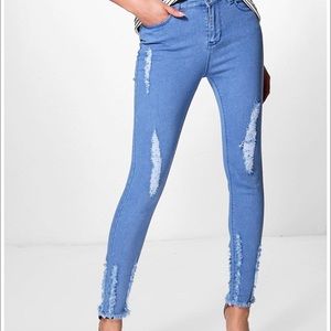High waist destroyed hem jeans
