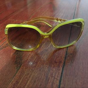 Yellow rectangular shaped sunglasses for kids.