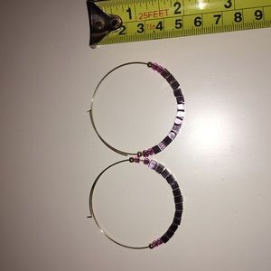 Hoop earring with purple beading