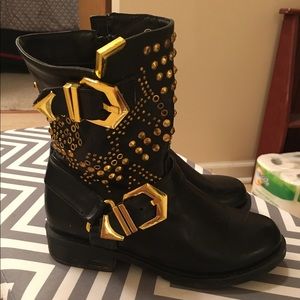 Black biker boots with gold embellishments