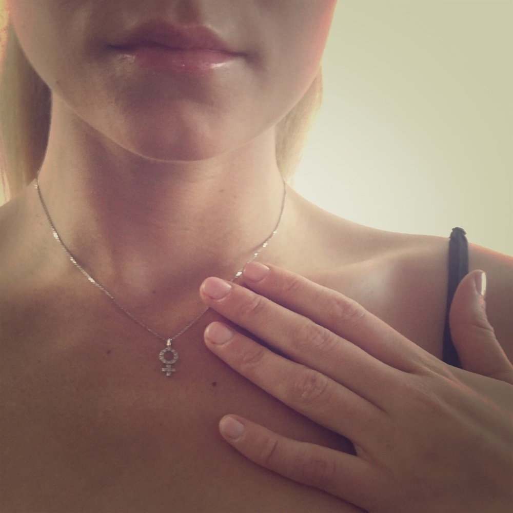 Barneys New York white gold and diamond pendant.