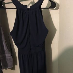 Navy knee length dress.