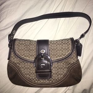 Brown small authentic coach handbag with buckle