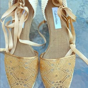 Calvin Klein Gold Wedge Lace Up Espadrilles.