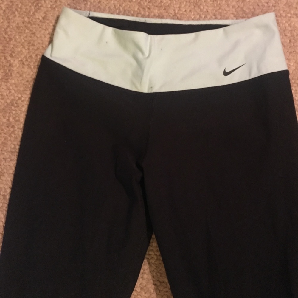 Black Nike leggings with light blue band