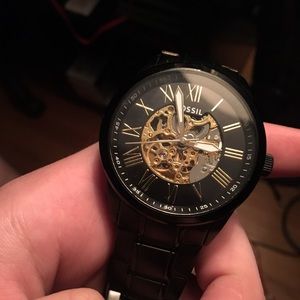 Black and Gold Fossil watch