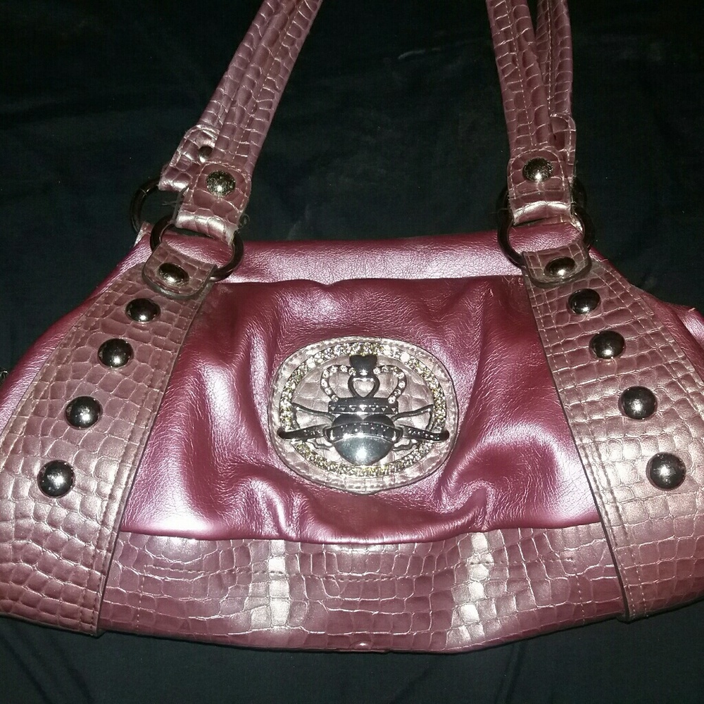 Kathy Van Zeeland purple purse