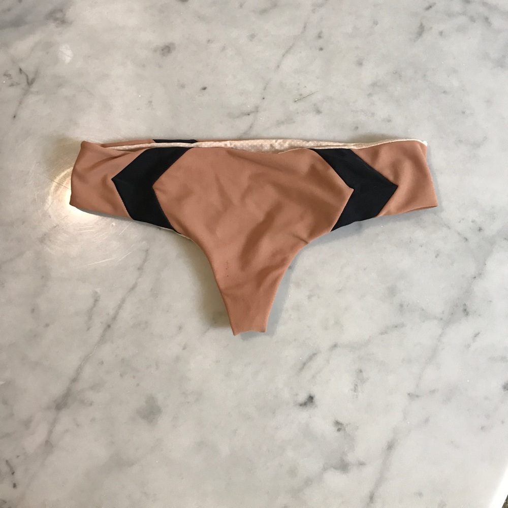 Acacia topless mentawai bottoms size small.