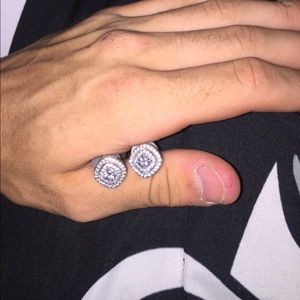 Diamond studded earrings.