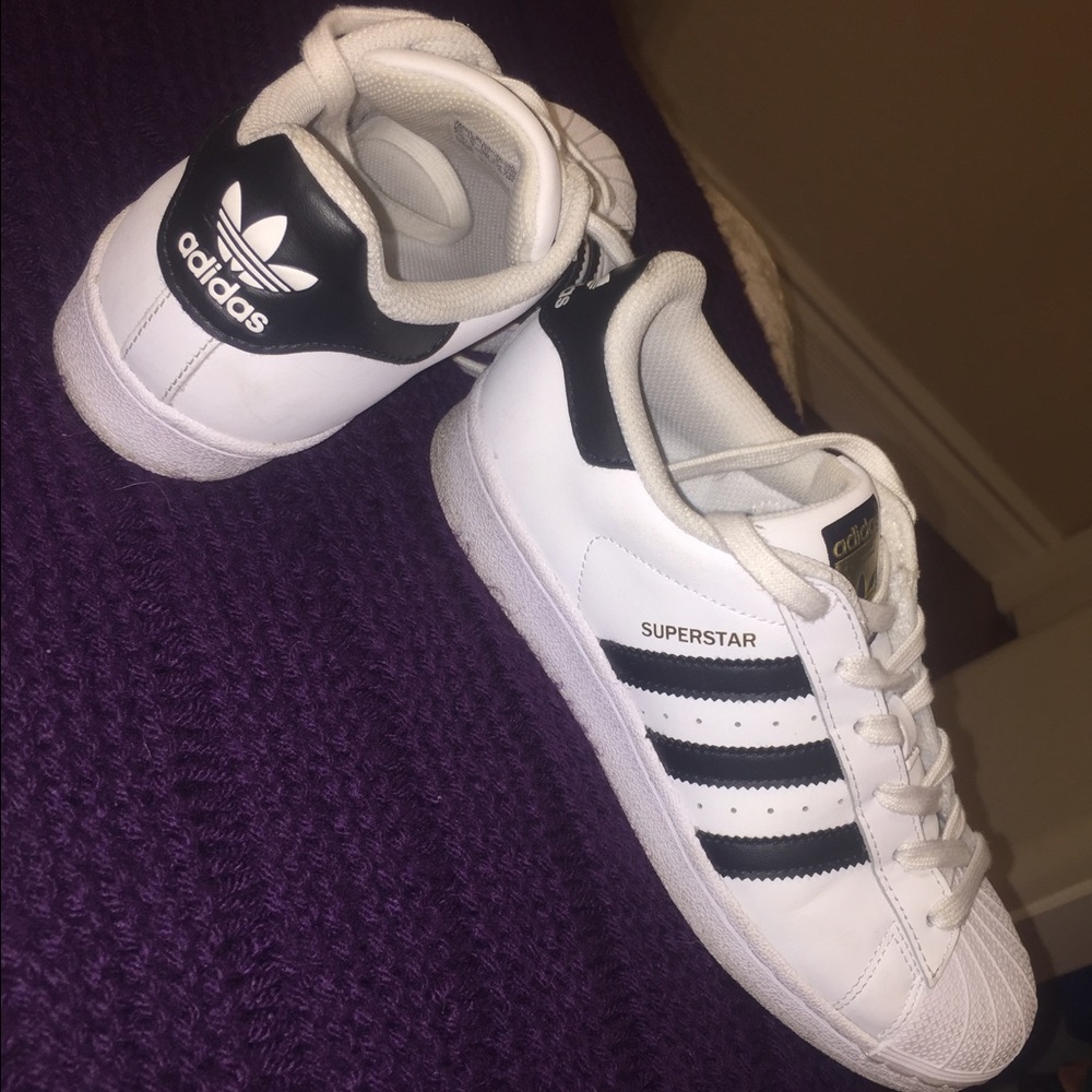 Original white adidas with black stripes