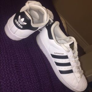 Original white adidas with black stripes
