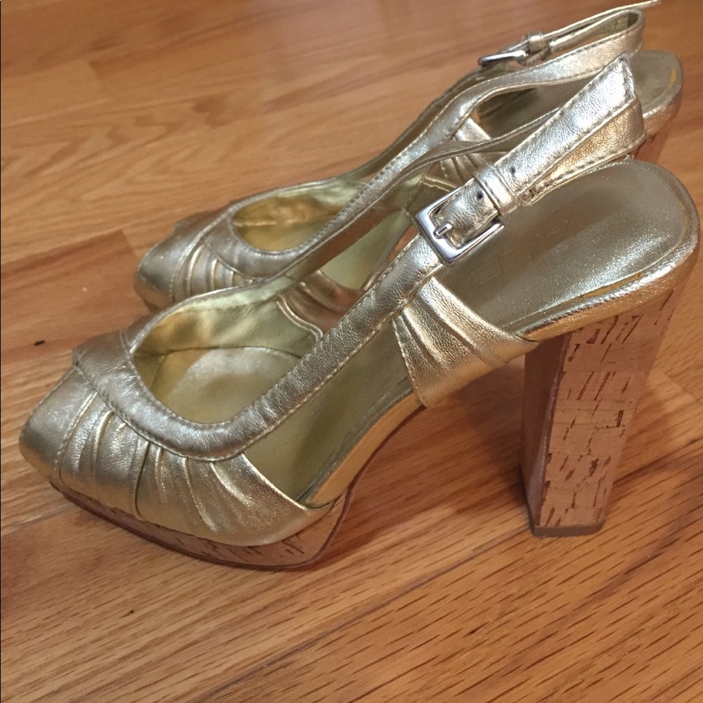 Gold sandals with cork heels