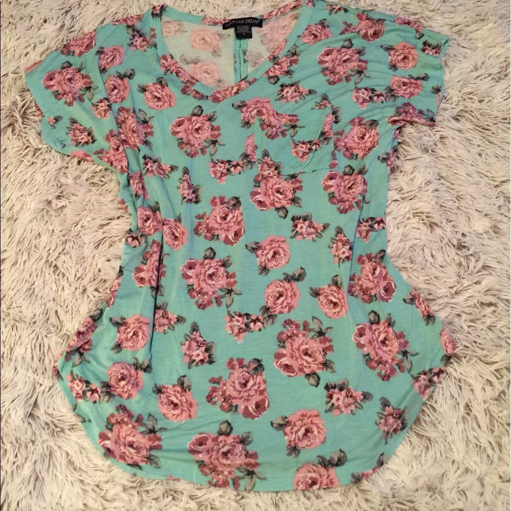 This floral shirt is so stylish and cute.