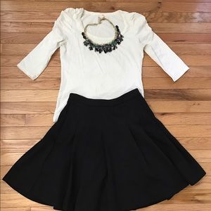 White scoop neck shirt from H&M w/ ruched sleeves.