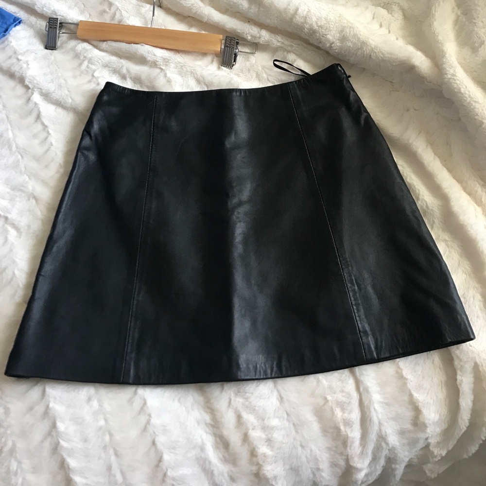 A line black leather mini skirt