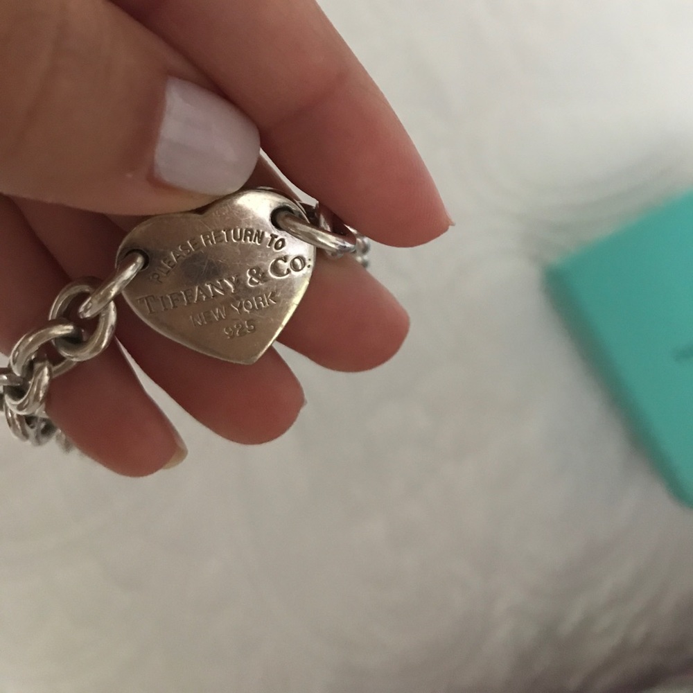 Used return to Tiffany & Co medium heart tag.