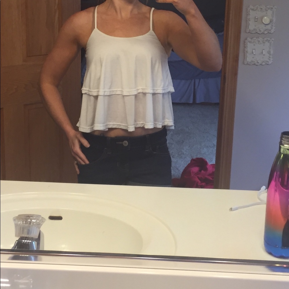 Cream flowy crop tank