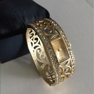Fashion watch with gold bangle & crystals