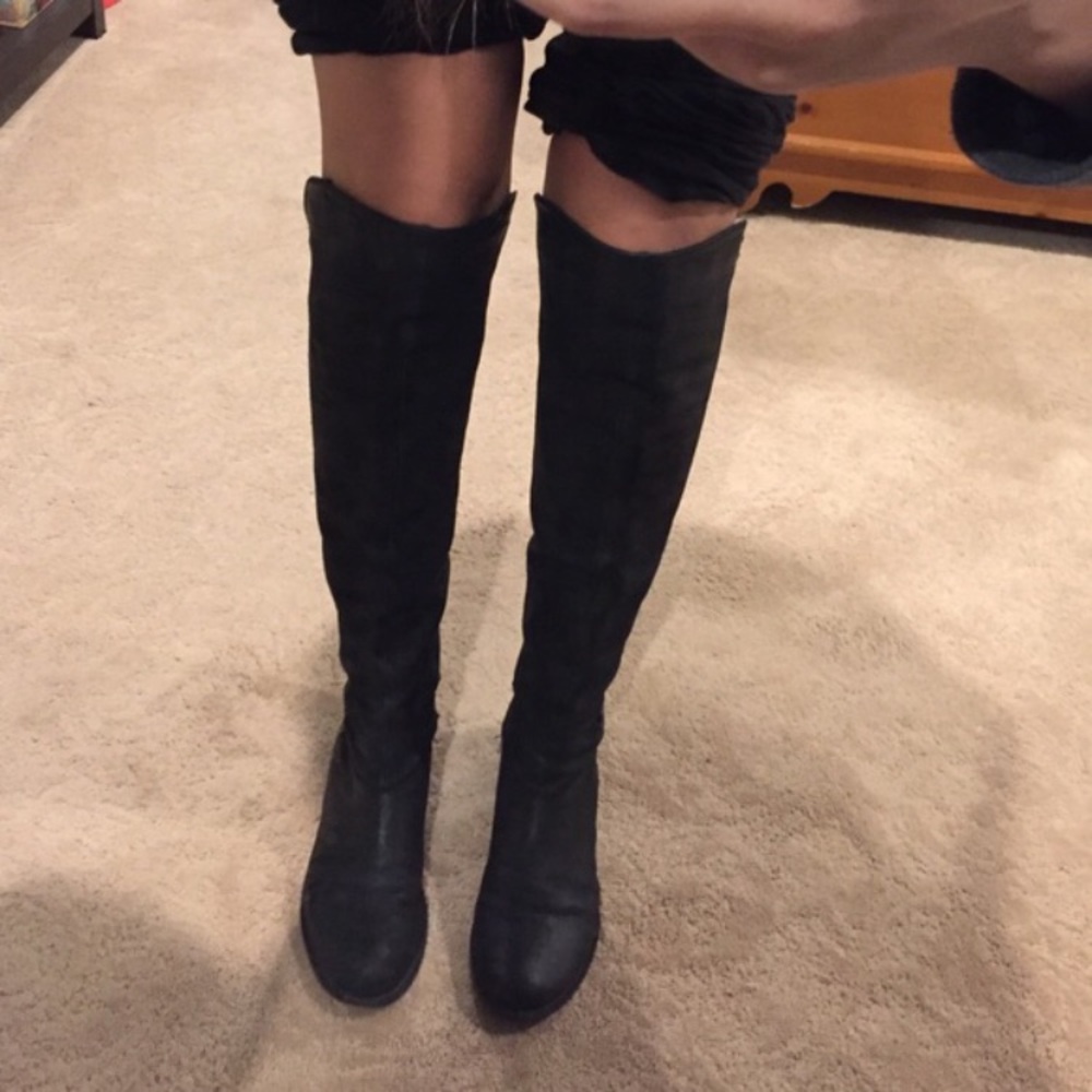 Knee high black leather boots